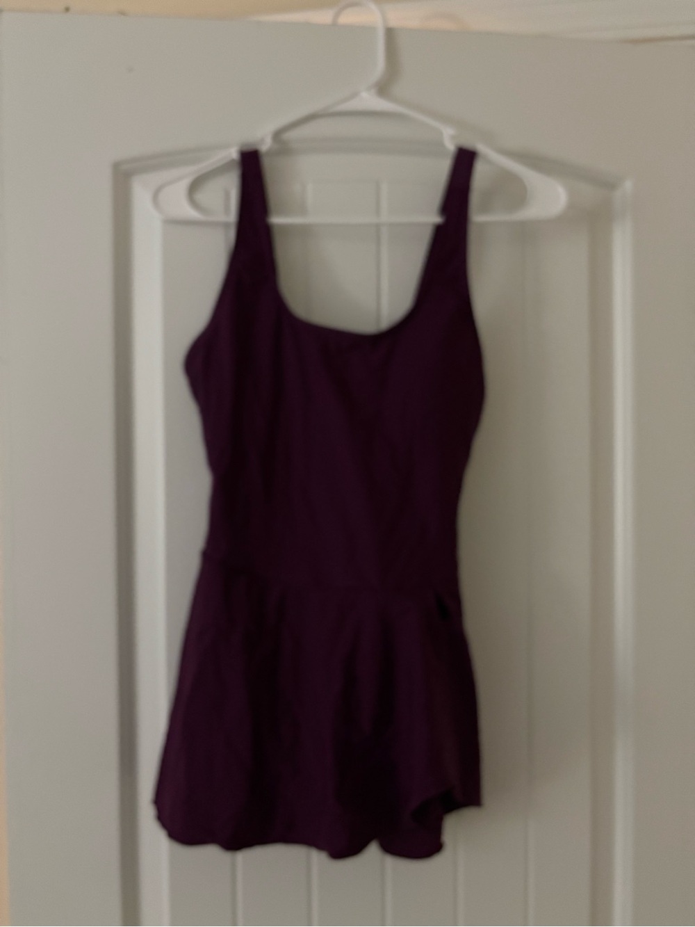 Burgundy whole piece bathing suit size small. Never worn.